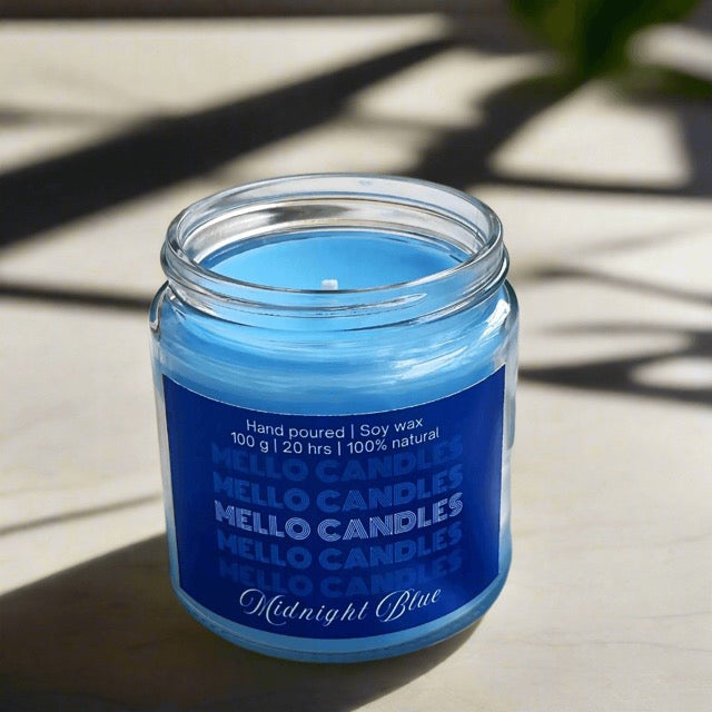 Citrus scented glass jar candle – zesty and refreshing aroma in minimal decorative container.