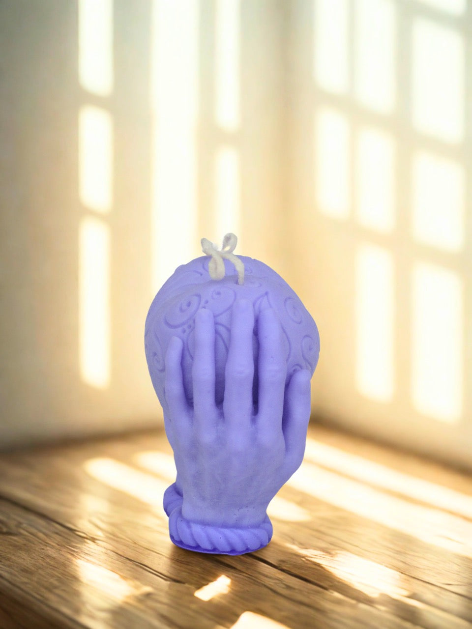 Mello Candle Palm Glow candle side view display placed on wooden floor.