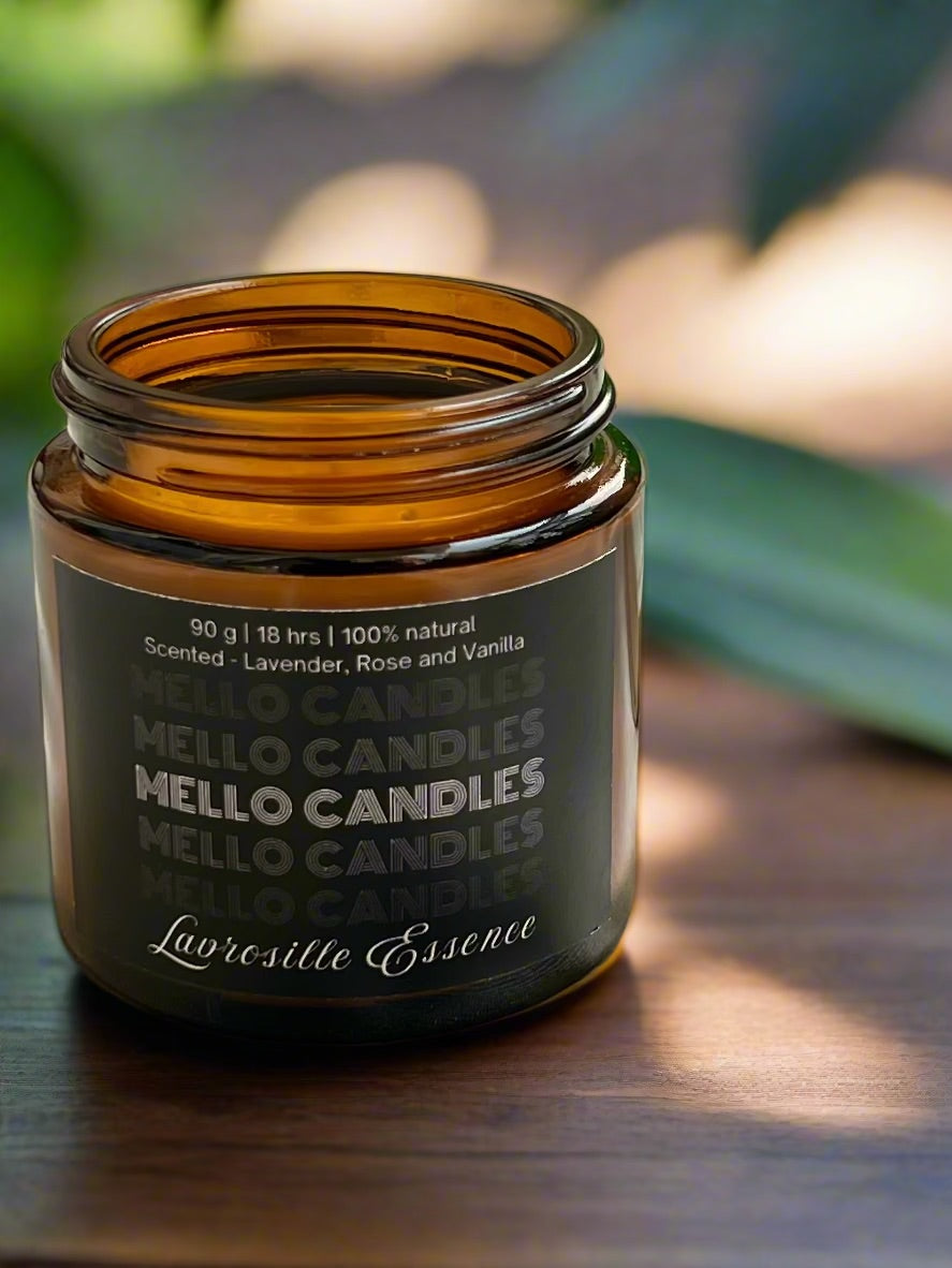 Lavrosille Essence candle on wooden table – lavender, vanilla and rose scented soy wax in glass jar.