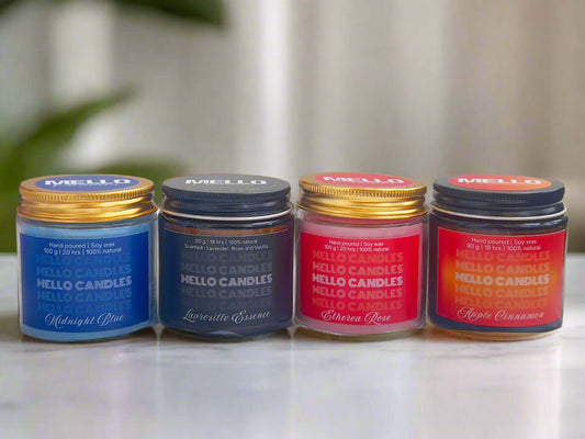 Glass candle set of 4 – blend of citrus, floral, fruity, and spicy scents in elegant glass jars.