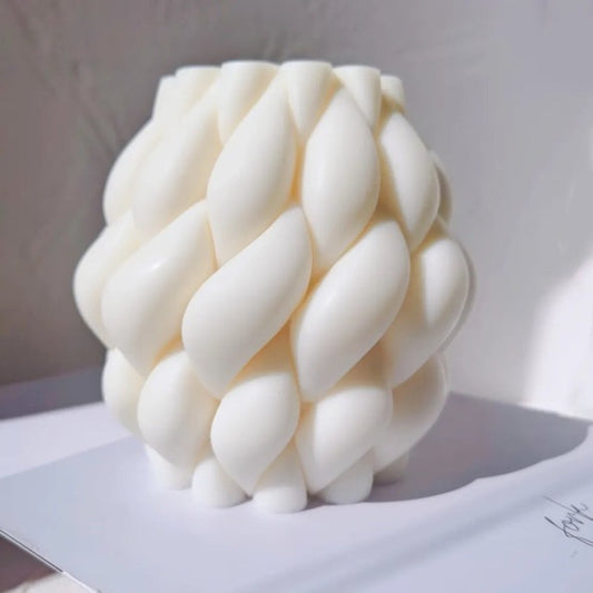 A unique, beautiful and Aesthetic spiral mould candle with white background
